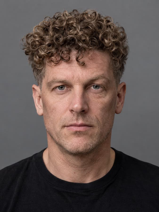 Tight perm on wavy hair